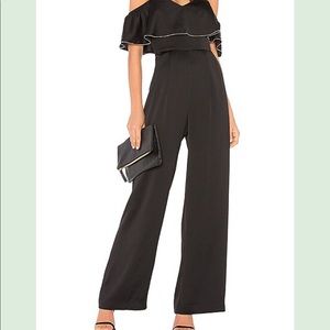 Devlin Off Shoulder jumpsuit in black with Silver Tone Trim on Ruffle size 6
